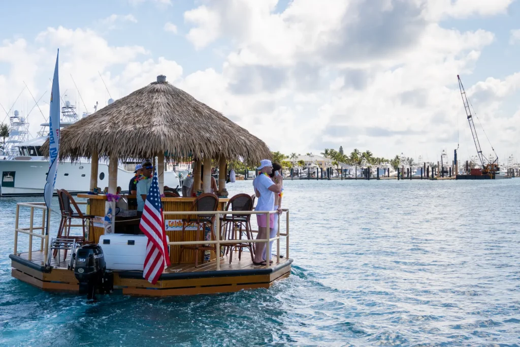 Cruisin' Tikis 16 commercial tiki boat docked at marina